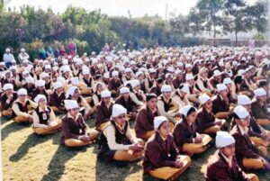 Students religiously attending the Gurupurab of Shri Guru Nanak Dev Ji