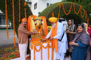 Paying Floral Tribute to Shri Guru Nanak Dev ji